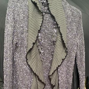 Ruffle and fringed cardigan.